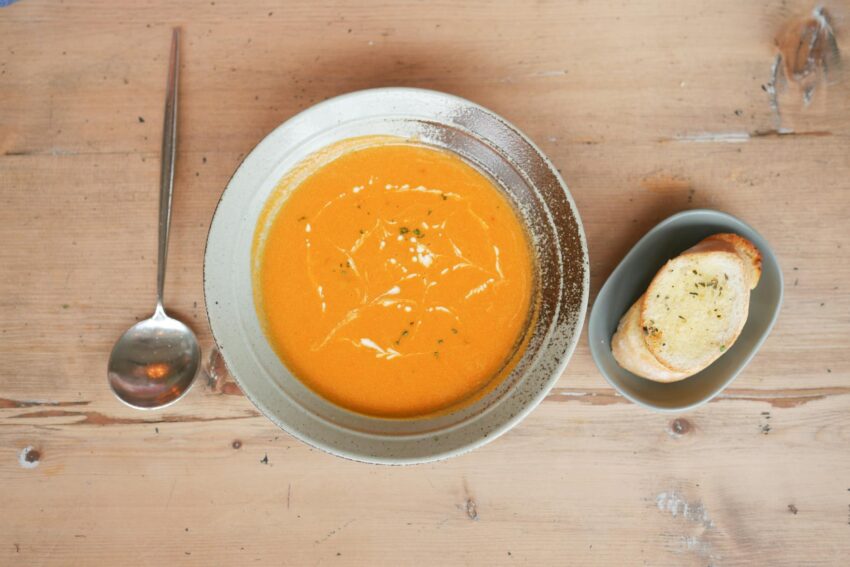 delicious pumpkin soup in ceramic bowl