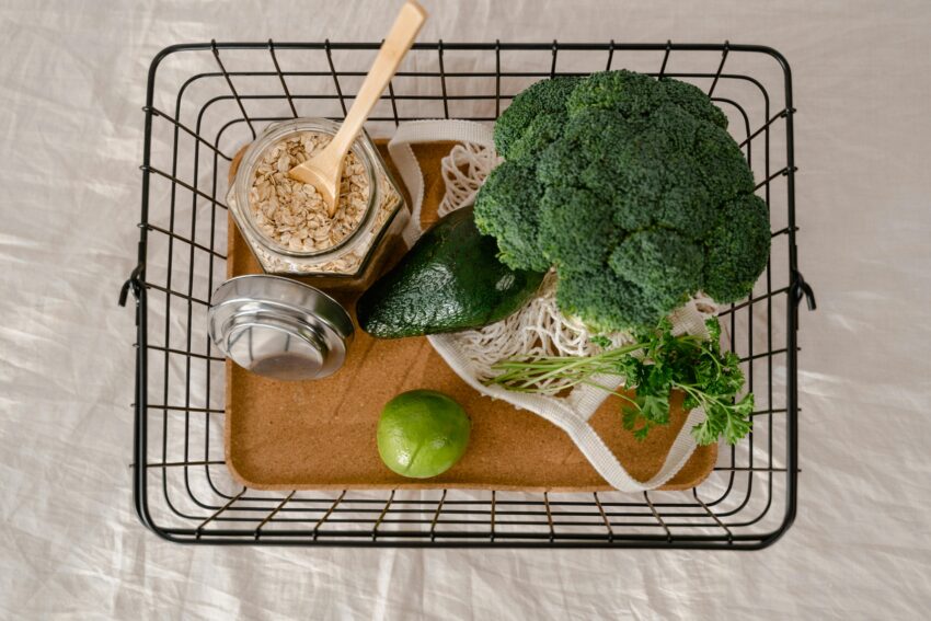 A basket of fresh produce and oats promoting a healthy and sustainable lifestyle.